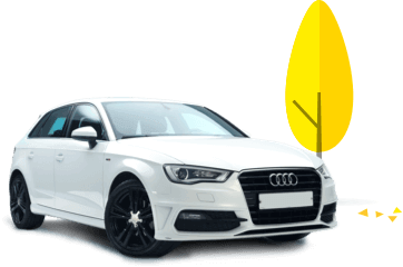 White Audi A3 beside a tree